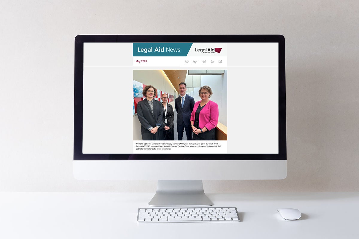 a computer screen shows an image of the Legal Aid News publication