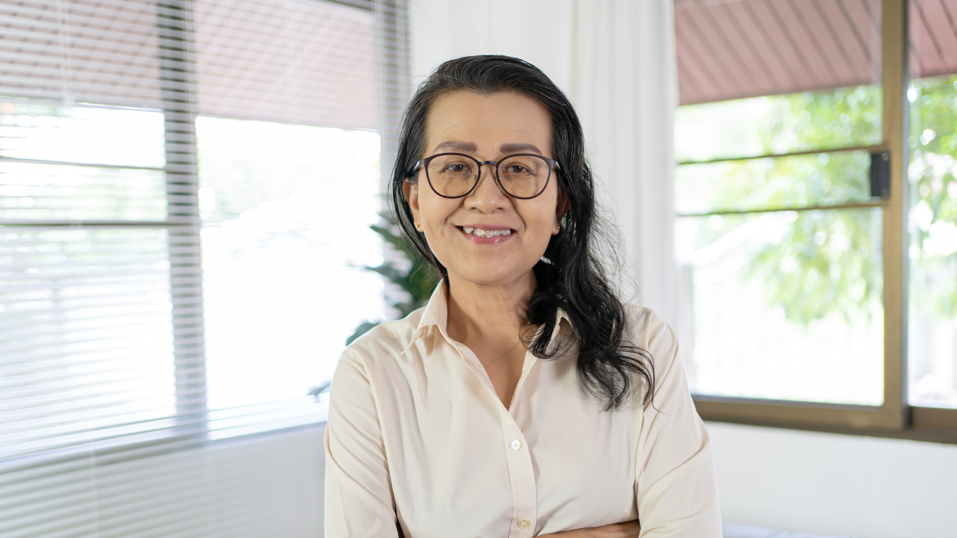 woman looking into the camera smiling