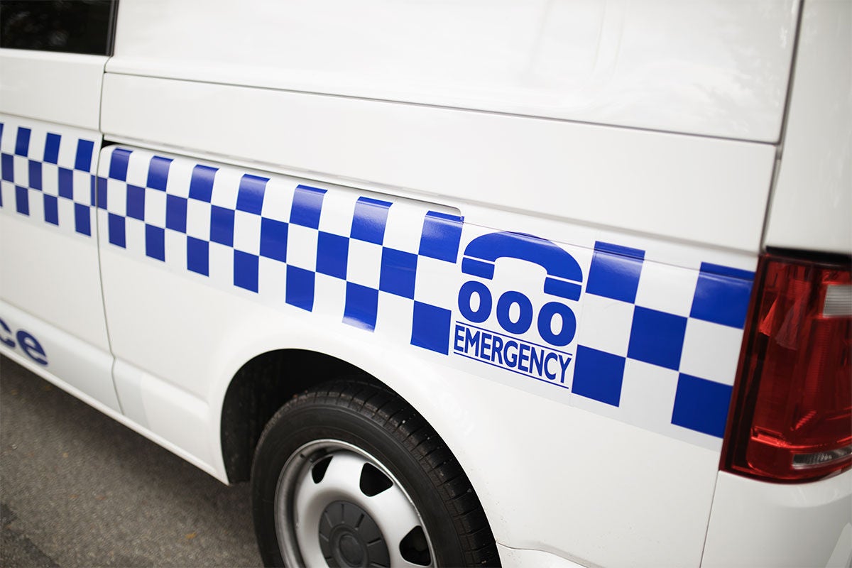 Side view of the back of a police van